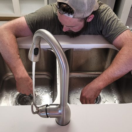 Home improvements as new plumbing in small kitchen.