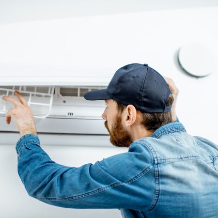 Man serving the air conditioner